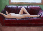 Nude woman lying on a couch
